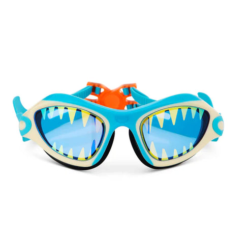 Blue swim goggles with shark design on a white background