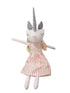 Unicorn plush toy with a striped dress on a white background