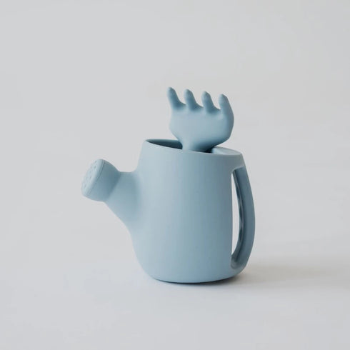 A silicone Blue watering can and fork set