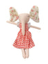 Doll with floral ears and a red checkered dress on a white surface