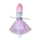 Stuffed bunny toy with a pink dress on a white background