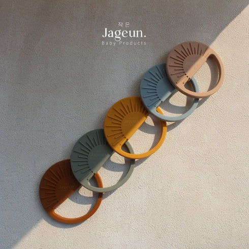 Sun Shape Silicone Teether in Yellow