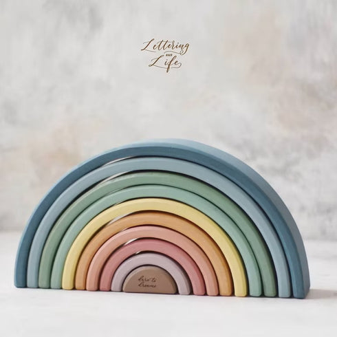 Wooden stacking toys in rainbow colors, ecofriendly toys