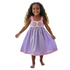 Young girl wearing a purple dress with pink accents on a white background