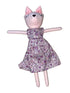 Cat-shaped doll with a floral dress on a white background