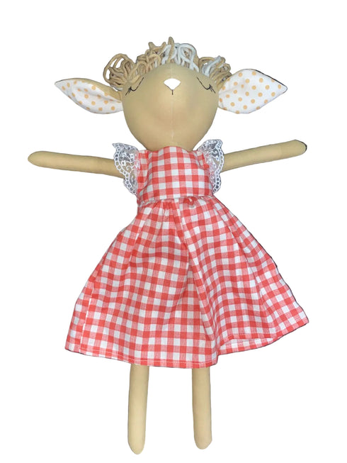 Doll with a red and white checkered dress on a white background