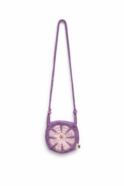 Purple crochet bag with a flower design on a white background