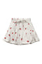 White skirt with red strawberry pattern handmade in Bali of soft cotton.
