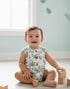 Baby using tropical romper